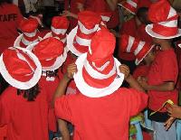 Young fans anxiously wait for a glimpse of the star.